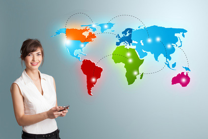 Woman_holding_phone_next_to_global_map