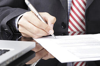 Headless_guy_filing_out_a_form_on_desk Headless_guy_filing_out_a_form_on_desk