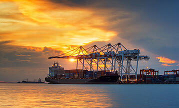 Cargo_ship_at_port_with_sunset Cargo_ship_at_port_with_sunset
