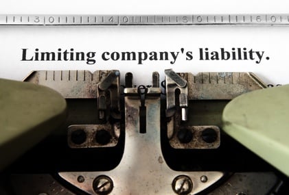 Limiting_companys_liability-on_typewriter
